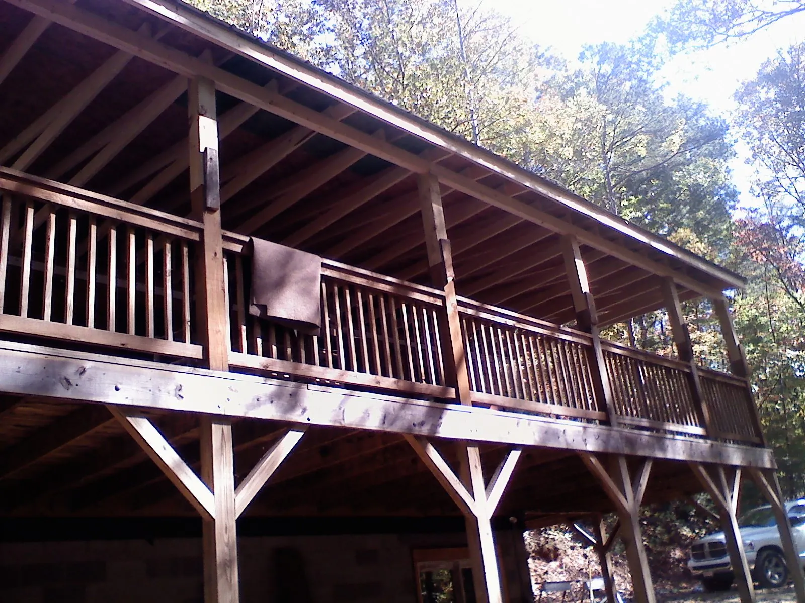 Timber framing under a new elevated porch and deck — Roof Leak Repair in New Washington by Roofing Brothers